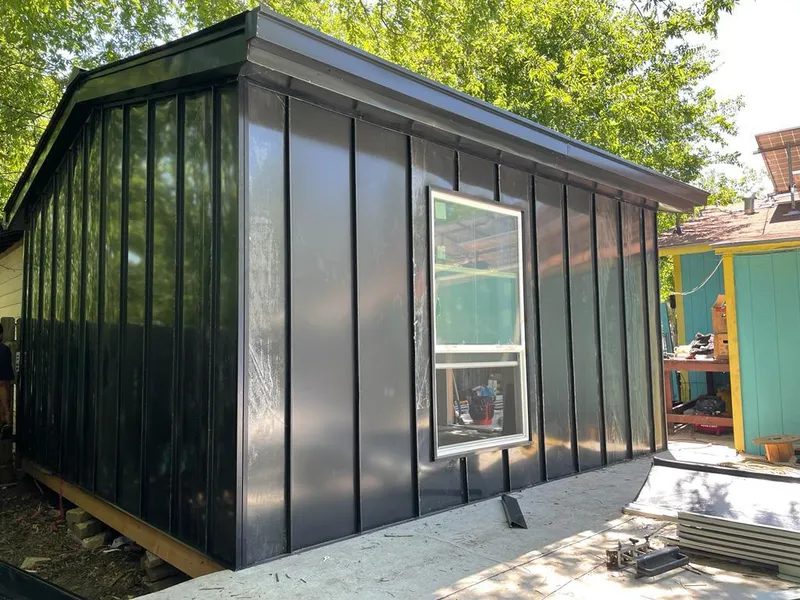 Black standing seam metal wall panels for Roof Inspection in Sandy